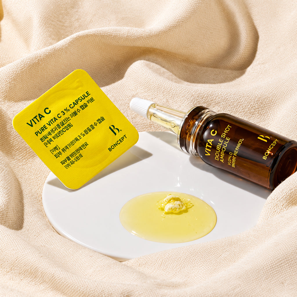 Boncept Vita C Double Shot Ampoule Kit - Fresh-Mix Brightening Serum (7-Day Treatment) with Vita C capsule and serum on plate.